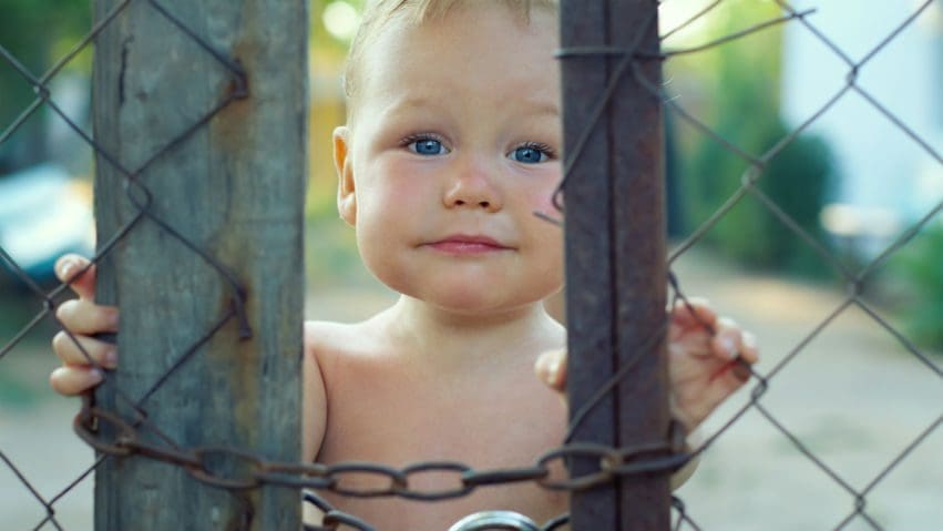 Baby behind a locked fence | Cloud Surfing Media Digital Marketing Toronto